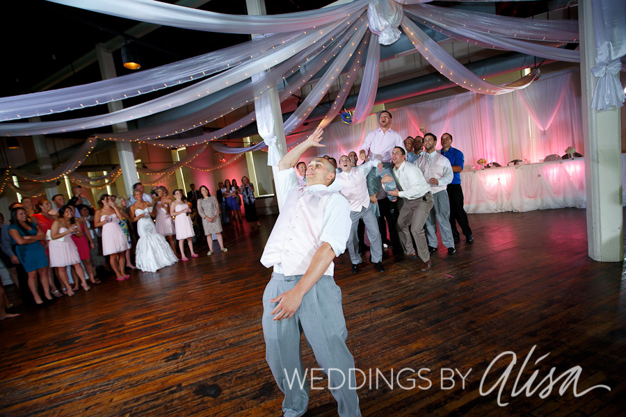 wheeling-artisan-center-river-city-wedding-reception-photographers-50 Tossing the garter to the guys at the reception